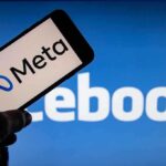 Meta and Facebook logos on screens.