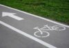 image of a bicycle path and a directional arrow