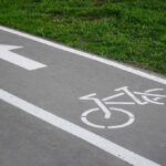 image of a bicycle path and a directional arrow