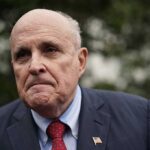 head shot of Rudy Giuliani looking concerned