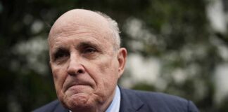 head shot of Rudy Giuliani looking concerned
