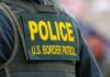 "Police U.S. Border Patrol uniform close-up."