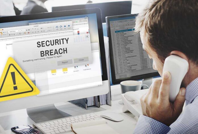 Security breach alert displayed on computer monitor.