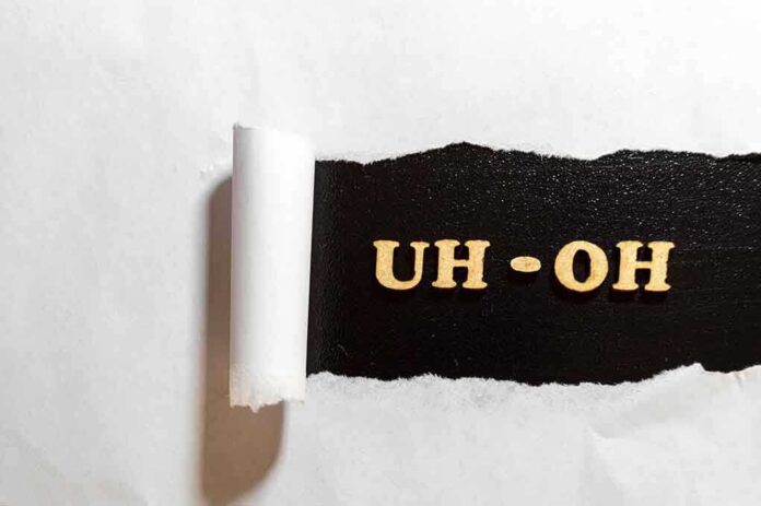1135625576 featured image Torn paper revealing "UH-OH" text underneath.
