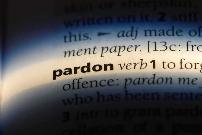1155434380 featured image The word "pardon" highlighted in a dictionary.