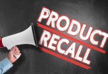 Megaphone announcing Product Recall on chalkboard background