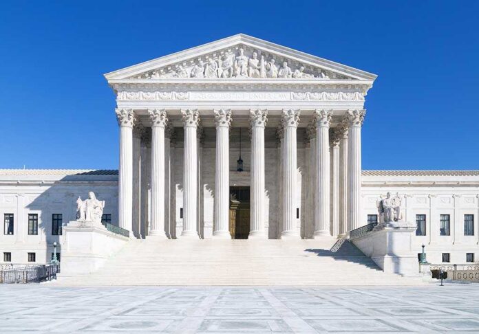 179112365 featured image United States Supreme Court building under clear blue sky.