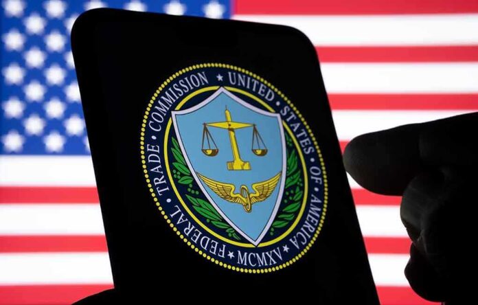 1999129859 featured image FTC logo on smartphone with American flag background.