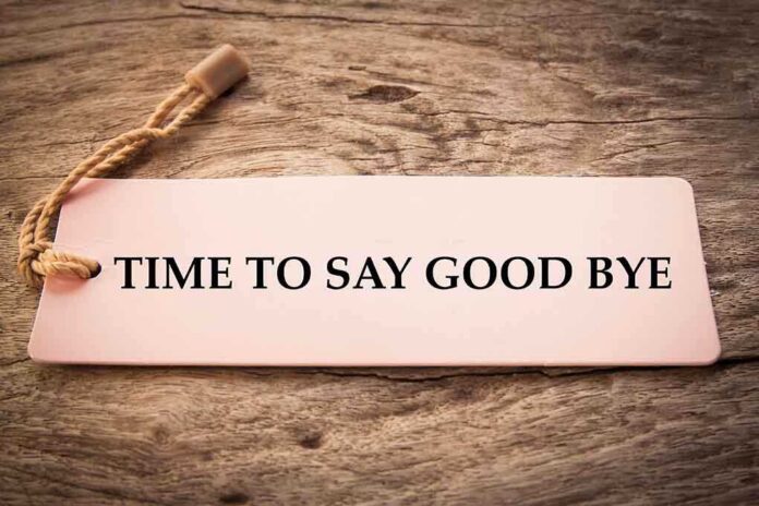 546660592 featured image Sign reads "TIME TO SAY GOOD BYE" on wood.