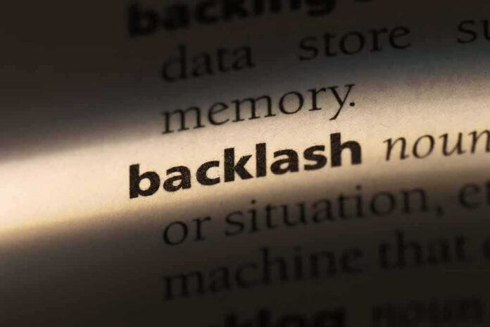 1068164030 featured image Highlighted word backlash in a dictionary page.
