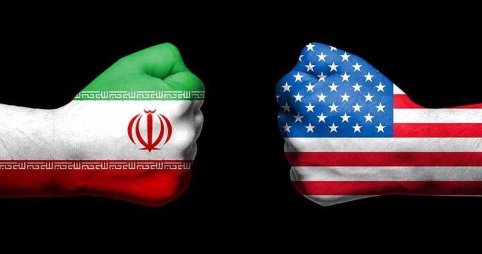 1086543533 featured image Two fists painted with Iran and USA flags