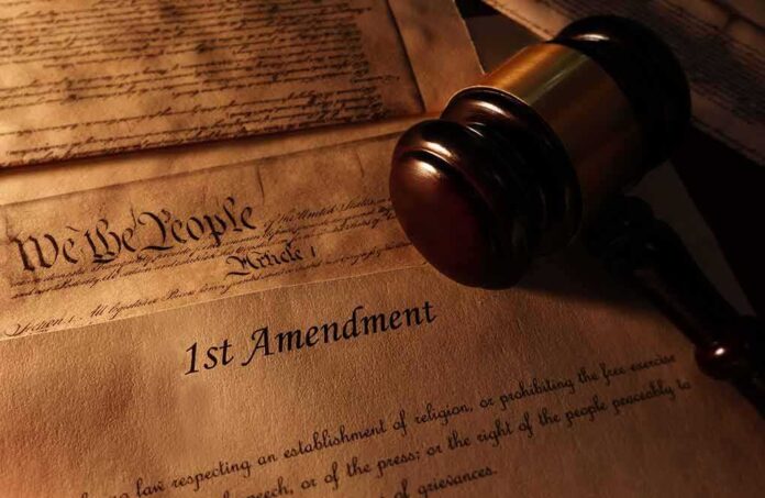 1126055060 featured image First Amendment document with gavel and Constitution background