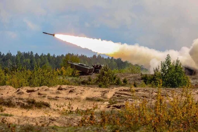 1302196150 featured image Military tank firing a missile in forest area.