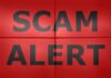 Scam alert text on red background