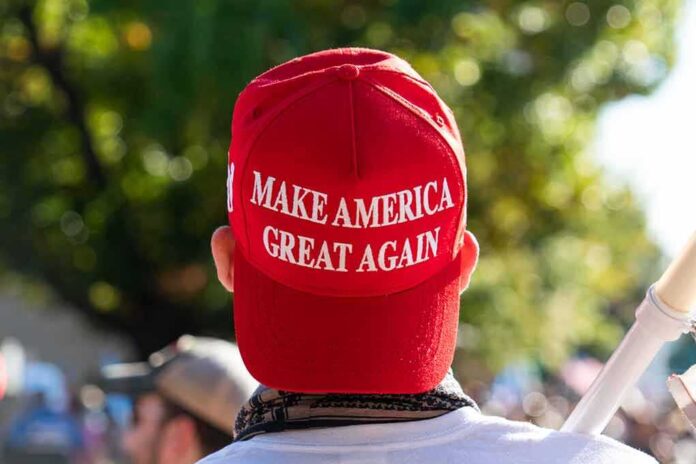1850438311 featured image Red Make America Great Again hat on person's head