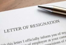 Resignation letter with a pen on top