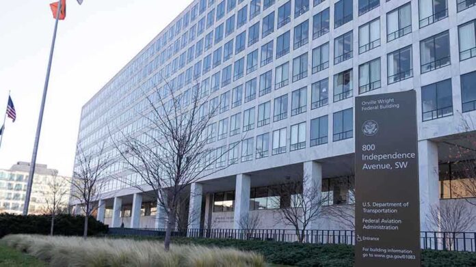 1606672486 featured image Orville Wright Federal Building with flags outside