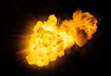 Bright, fiery explosion against a dark background.