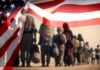 Line of people walking under American flag overlay.