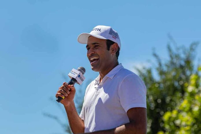 2346795639 featured image vivek holding a mic