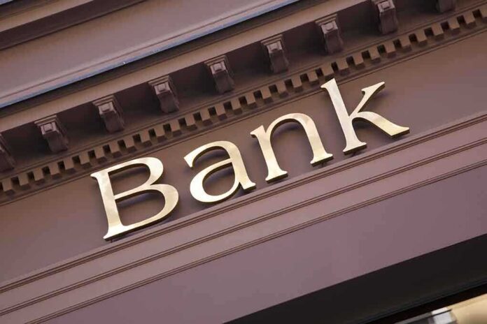 240120346 featured image Gold bank sign on building facade