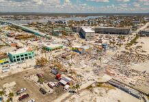 Aerial view of damaged buildings and debris