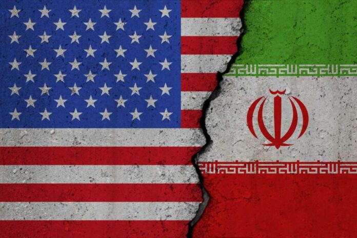 shutterstock_2376265565.jpg featured image United States and Iran flags divided by crack