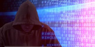 Person in hoodie using laptop, surrounded by digital code.