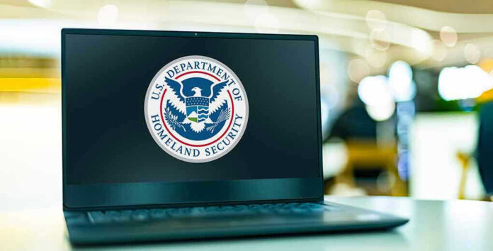 2287986767 Laptop displaying US Department of Homeland Security logo