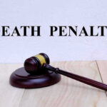 "Gavel with 'Death Penalty' text background."
