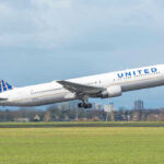 United airplane taking off from a runway.