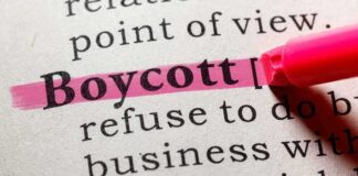 Highlighted definition of the word 'boycott' in a dictionary