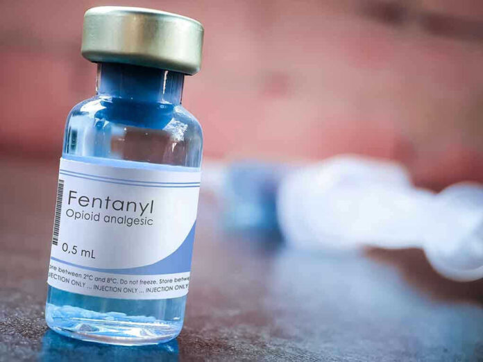 1984338443 Fentanyl vial labeled as opioid analgesic.