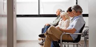 A diverse group of patients sitting in a waiting room