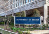Department of Energy sign outside a government building.