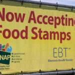 Supreme Court SPEAKS — SNAP Payments Judgment Yellow sign now accepting food stamps EBT SNAP
