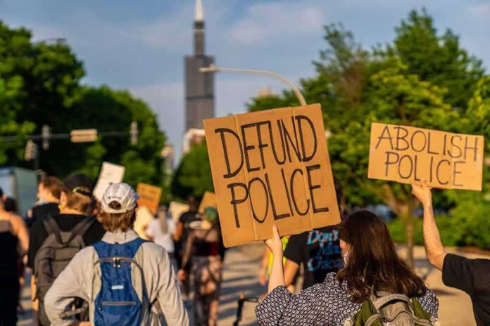 Protesters holding signs advocating for police reform