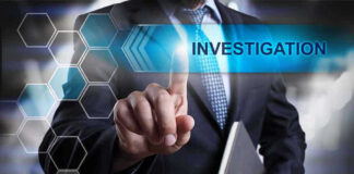 Man in suit pointing at Investigations text.