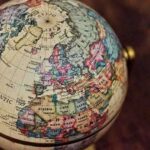 Greenland’s Hidden Worth: Why Trump Wants It A vintage globe displaying various countries and oceans