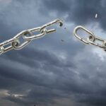 TOP Democrat BREAKS Rank– Look Who She BLAMES NOW A broken metal chain against a stormy sky