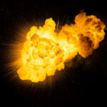 Hate Crimes EXPLODE 182% After Shocking Policy REVERSAL Bright, fiery explosion against a dark background.
