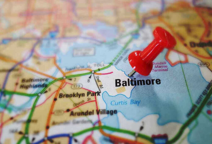 Red pushpin marking Baltimore on a map.