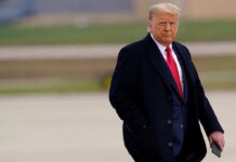 Trump-Jackson Bond: The Story They Buried Donald Trump walking outdoors in formal attire