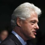Clintons Fold—Epstein Probe Bombshell Profile portrait of a man with gray hair in formal attire