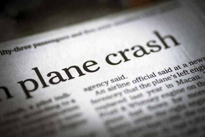 290501621 Newspaper headline about a plane crash story
