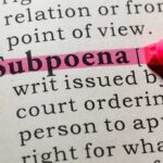 Highlighted definition of 'subpoena' in a dictionary