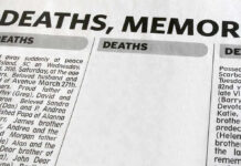 Newspaper obituary section with death notices.