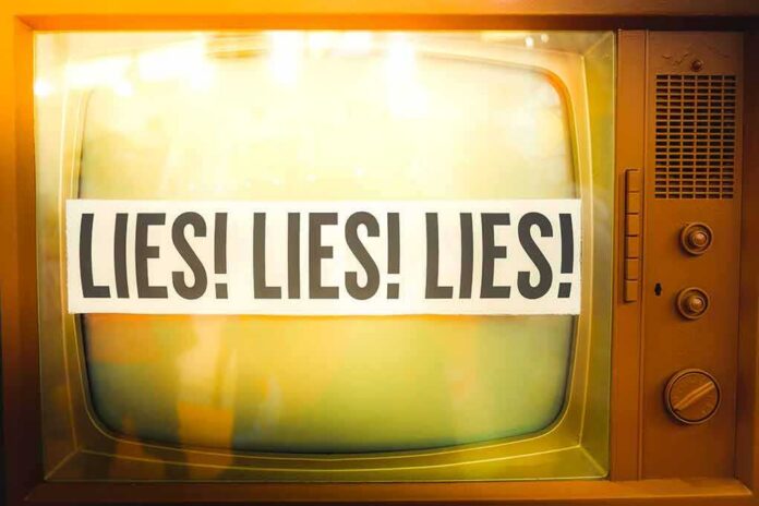 A vintage television displaying the repeated phrase 'LIES LIES LIES'