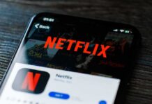 Close-up of a smartphone displaying the Netflix app interface