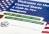 Green Card Shock: NEW RULE Forces MAJOR DEPARTURES A guide for new immigrants alongside permanent resident cards and an American flag